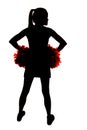 Young girl cheerleader silhouette with hands on hips Royalty Free Stock Photo