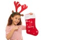 Young girl with a Christmas stocking Royalty Free Stock Photo