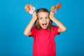 Girl with colorful lollipops