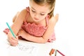 Young Girl Coloring with Pencils