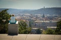 Young girl contemplating above cityscape, Prague, Czech Republic