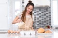 Young girl cooking bakery bread concept, making cake with egg