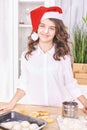 Young girl cooking at kitchen. Curly pretty child portrait. Chef student Royalty Free Stock Photo