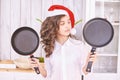 Young girl cooking kitchen. Curly pretty child portrait. Chef christmas student Royalty Free Stock Photo