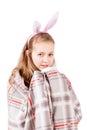 Young girl covered with blanket drink tea isolated