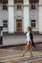 Young girl crosses the road Royalty Free Stock Photo