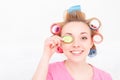 Young girl with curlers on her hair Royalty Free Stock Photo