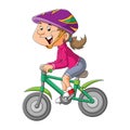 The young girl is cycling with the bicycle