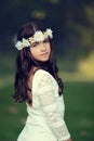 Young girl with daisy chain headband Royalty Free Stock Photo