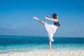 Young girl dance at tropical beach Royalty Free Stock Photo