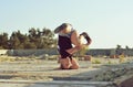 Young girl dancing break dance on the street