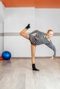 Young girl dancing in the gym. The concept of sport, dance and a Royalty Free Stock Photo