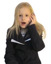 Young girl dialing phone number Royalty Free Stock Photo