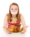 Young girl on a diet, and want to eat meat Royalty Free Stock Photo