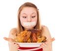 Young girl on a diet, and want to eat meat Royalty Free Stock Photo