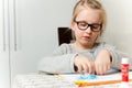 Young girl doing artwork with paper Royalty Free Stock Photo