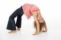 Young Girl Doing Backflip In Studio Royalty Free Stock Photo