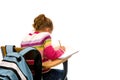 Young girl doing school work at desk