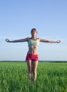 Young girl doing yoga against nature Royalty Free Stock Photo