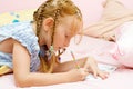 Young girl drawing Royalty Free Stock Photo