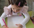 Young Girl Drawing a Picture