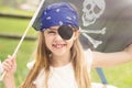 Young girl dressed as a pirate in a tub Royalty Free Stock Photo
