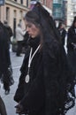 Widow in the procession of Easter in Valladolid, Spain