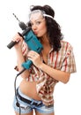 A young girl with drilling machine Royalty Free Stock Photo