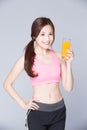 Young girl drink orange juice