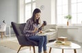 Young girl drinking coffee and eating vegetable salad from takeaway meal delivery Royalty Free Stock Photo