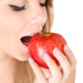 A young girl eating an apple Royalty Free Stock Photo