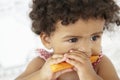 Young Girl Eating Carrot Stick Royalty Free Stock Photo