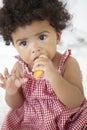 Young Girl Eating Carrot Stick Royalty Free Stock Photo