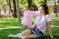 Young girl eating cotton candy Royalty Free Stock Photo