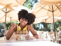 Young girl eating a fresh salad outdoors Royalty Free Stock Photo