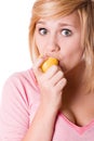 Young girl eating lemon Royalty Free Stock Photo