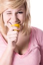 Young girl eating lemon Royalty Free Stock Photo