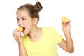 Young girl eating lemon fruit