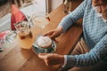 Young girl eating pancakes and drink coffee