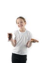 young girl eating pizza and drinking an ice drink.