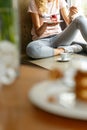 Young girl eating small raspberry cake Royalty Free Stock Photo