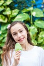 Girl eating a traditional water ice cream typical of the Valle del Cauca region in Colombia Royalty Free Stock Photo