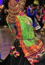 A young girl enjoying hindu festival of Navratri Garba wearing traditional consume.