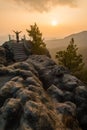 Young girl enjoying romantic view at Saxon-Bohemian sandstone region, Bohemian Switzerland, Czech republic