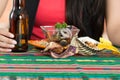 Young girl enjoying a seafood cebiche