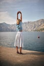 Young girl enjoys by the lake