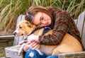 Girl hugs her seizure support dog