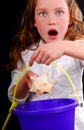 Young Girl Excited at Finding Seashell