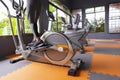 Young girl exercise bike cardio workout at fitness gym Royalty Free Stock Photo