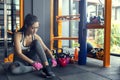 Young girl exercise bike cardio workout at fitness gym Royalty Free Stock Photo